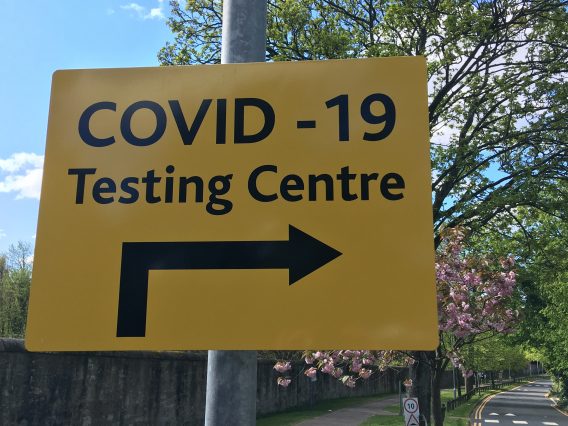 Sign post to a Covid-19 testing centre