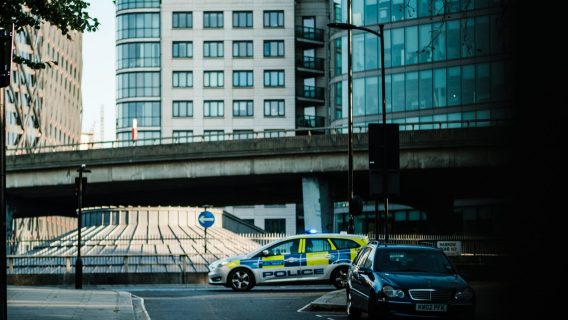 Image shows a police car on a road