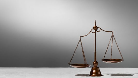 Image shows the scales of justice
